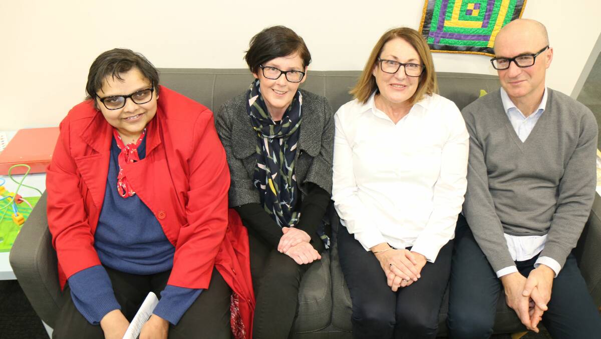 TEAM WORK: FedUni’s Dr Tejaswini Patil and Dr Sharon McDonough, and Berry Street’s Jo Fogarty and Andrew McCausland at the announcement of the partnership. 