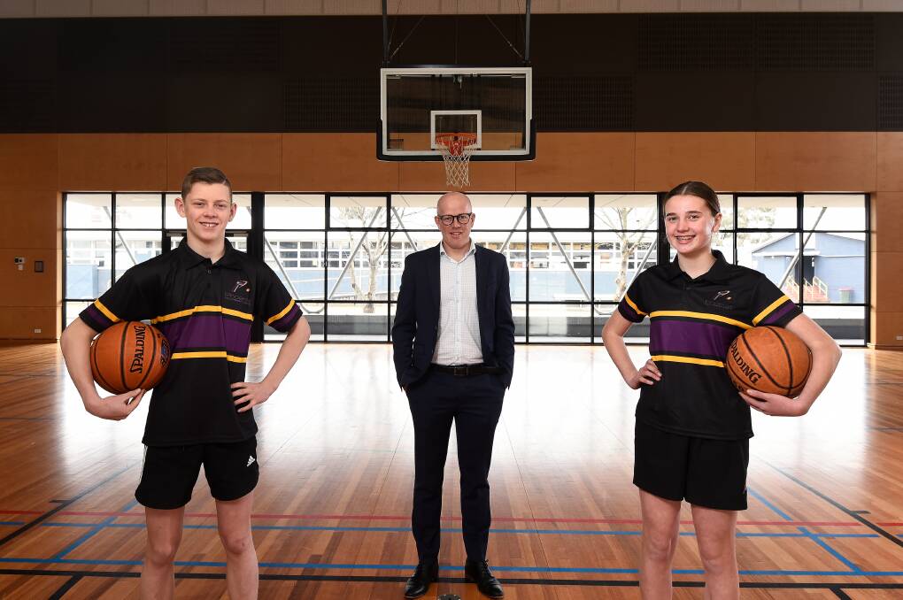 SPORT: Phoenix P-12 Community College year nine students Jesse Somers (left) and Catriona Harricks, with assistant principal Grant Luscombe, are part of the school's new Phoenix Academy of Sport. Picture: Adam Trafford