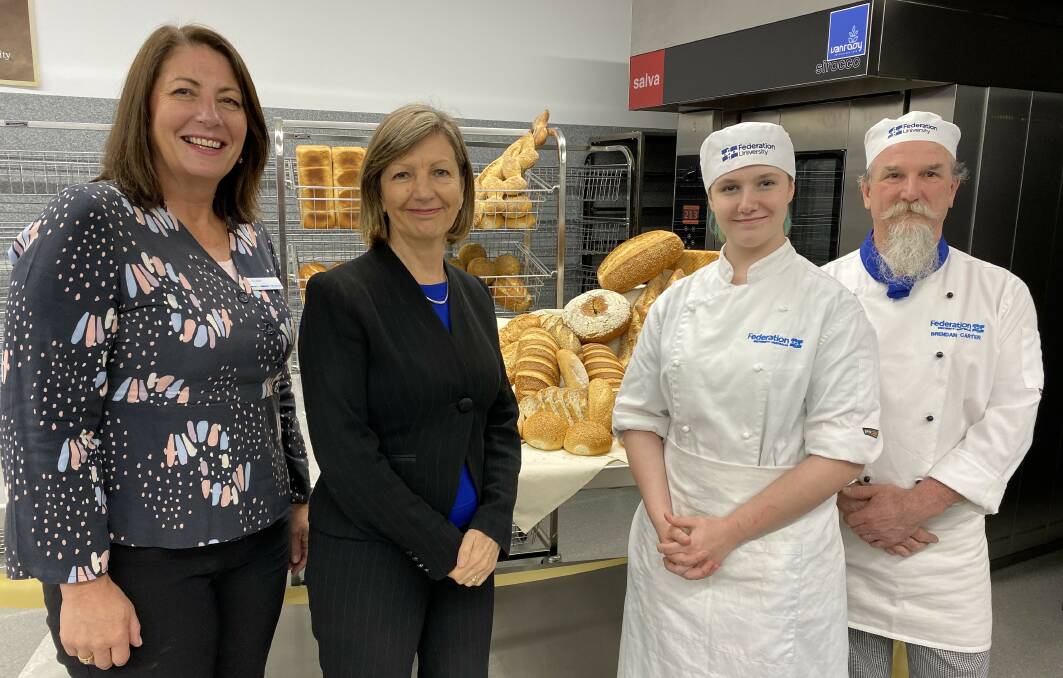 BREAD: Federation University's Jill Coote, vice chancellor Professor Helen Bartlett, first year apprentice baker Tylah and teacher Brendan Carter at the opening of the new Baking Training Centre. Picture: Michelle Smith