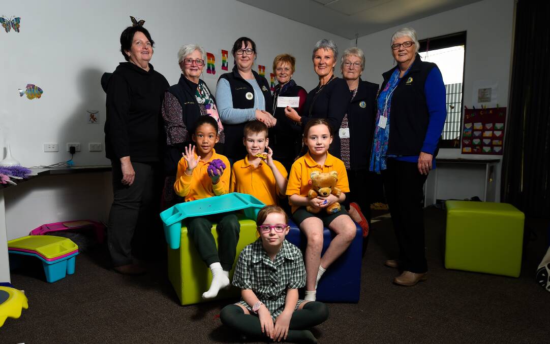 CHEQUE: Members of Alfredton Lucas Lions Club, Alfredton Primary School staff and students in the school's sensory room. Picture: Adam Trafford
