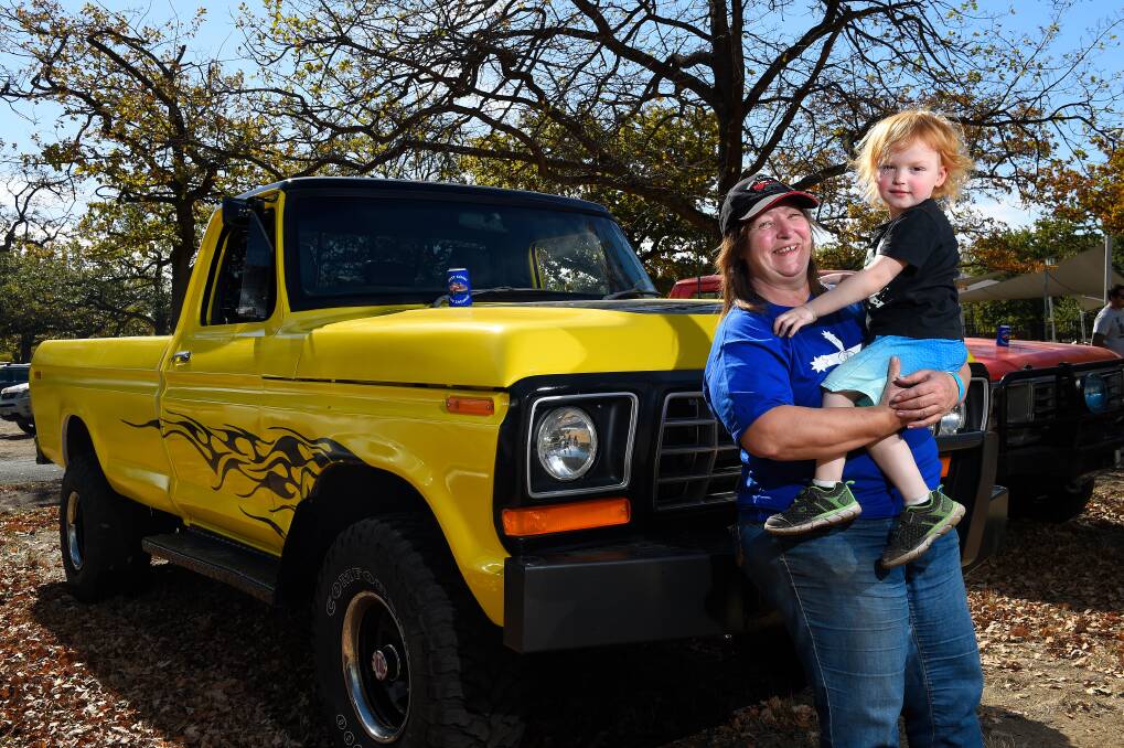 FAMILY CAR: Marg Schultz and her grandson Andrew Brook during the F Series and Bronco Roundup vehicle display in Victoria Park. Picture: Adam Trafford