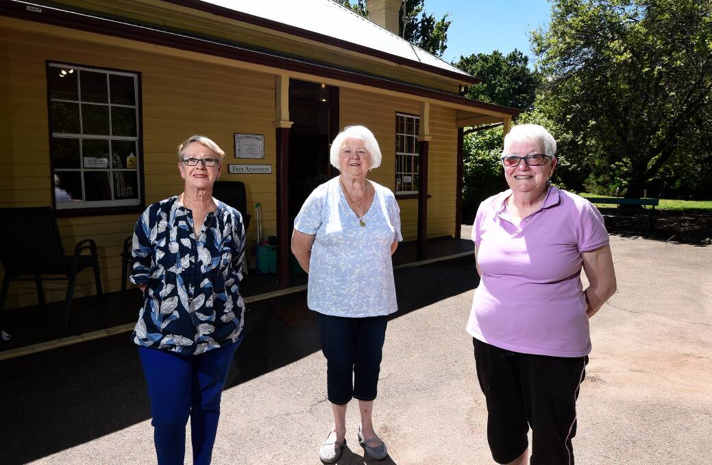 READY: Cathryn O'Connor, Dawn Harrington and Liz Cocks from Craft Council Ballarat at the cottage. 