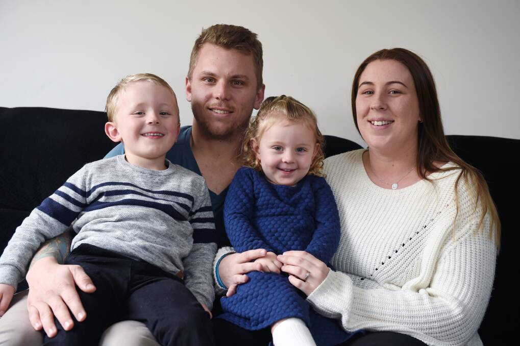 HOME: The Courtney family - Josh and Danielle with Xavier, 4, and Charlotte, 2. Picture: Kate Healy