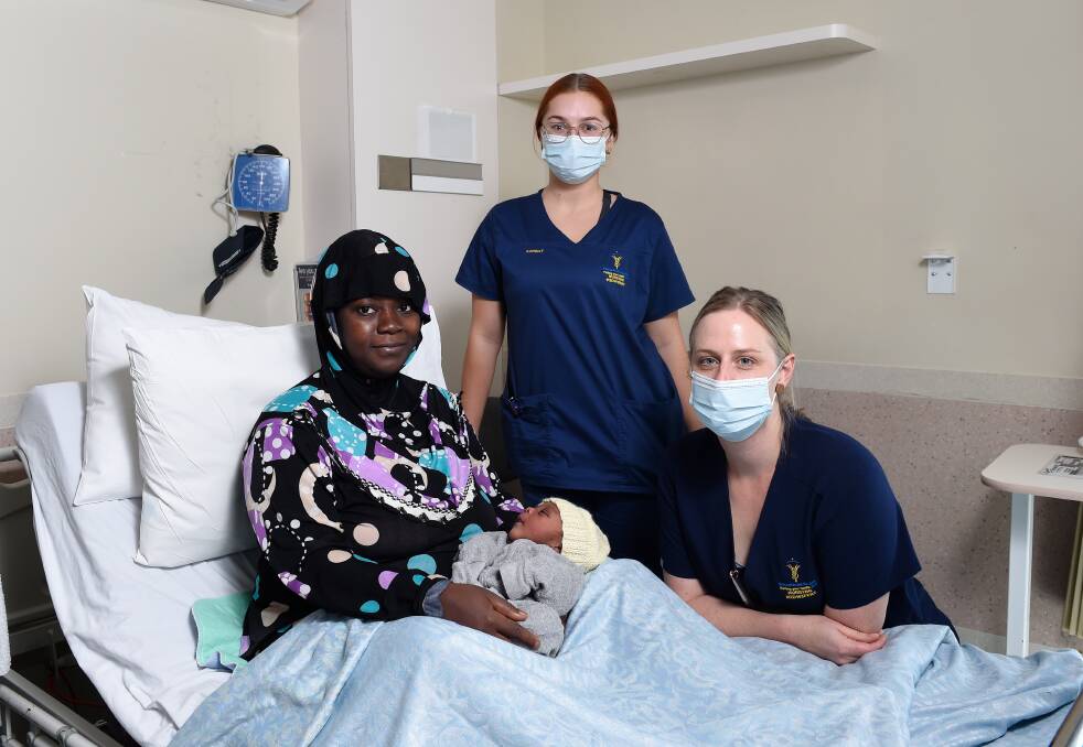 NEW ARRIVAL: Fatumata Kamara with her newnorn son (currently unnamed) and midwives Harriet Kied (middle) and Maree Buchanan on International Midwives Day at Ballarat Health Services. Picture: Adam Trafford