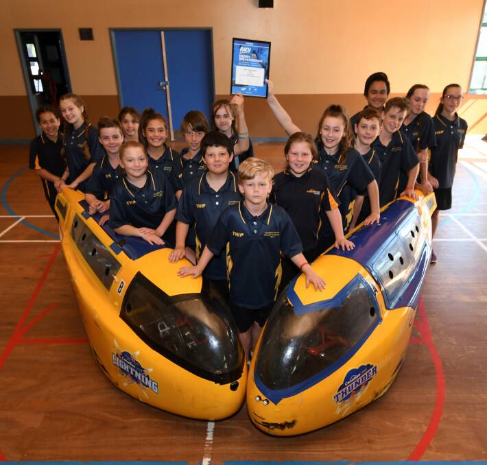 ENERGY WISE: Canadian Lead Primary School's human powered vehicle teams, drawn from students in grades four to six, celebrate their endurance success at the RACV Energy Breakthrough at Maryborough. Picture: Lachlan Bence