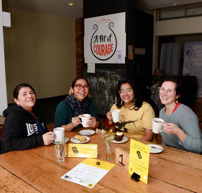 CONNECTION: Olga Herrera, Lilly Wright, Rishna Gunness and Tess Altman share coffee, cake and conversation at A Pot of Courage's chatty table. Picture: Kate Healy