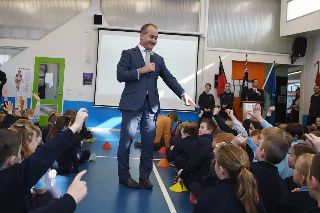 ANNOUNCEMENT: James Merlino takes questions from Miners Rest Primary School after telling them a re-elected Labor government would build a new school. Picture: Kate Healy
