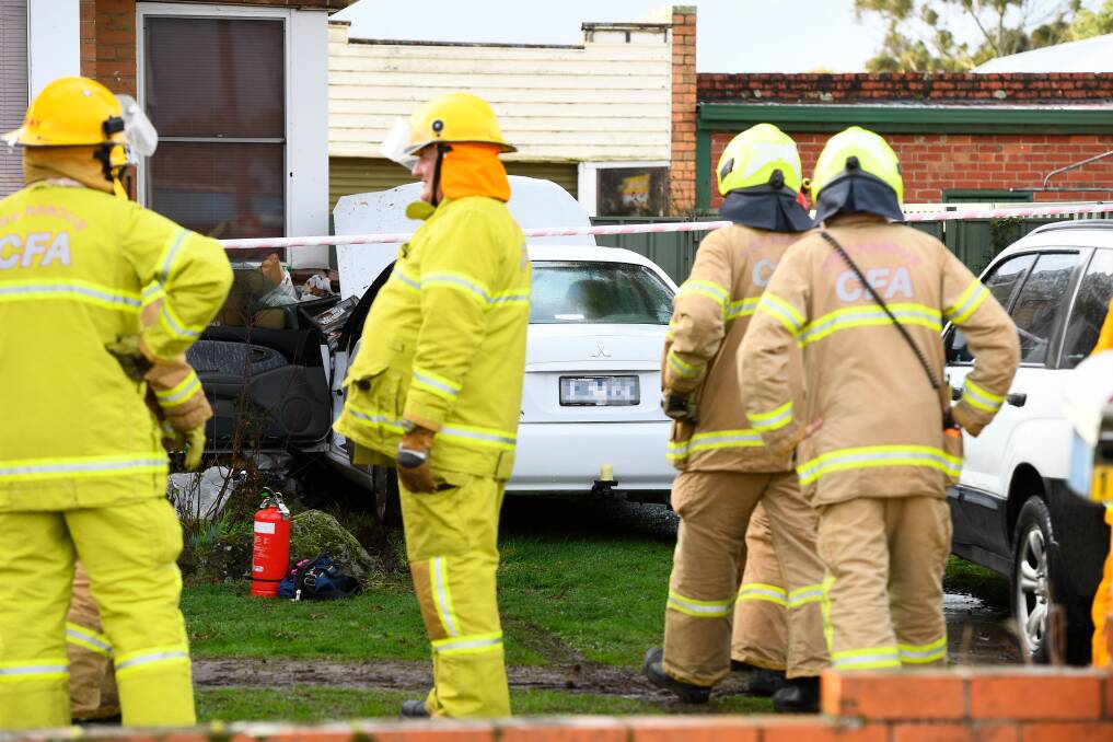 CRASH: Emergency services attended an incident where a car ran in to a house on Howitt St on Sunday. Picture: Adam Trafford