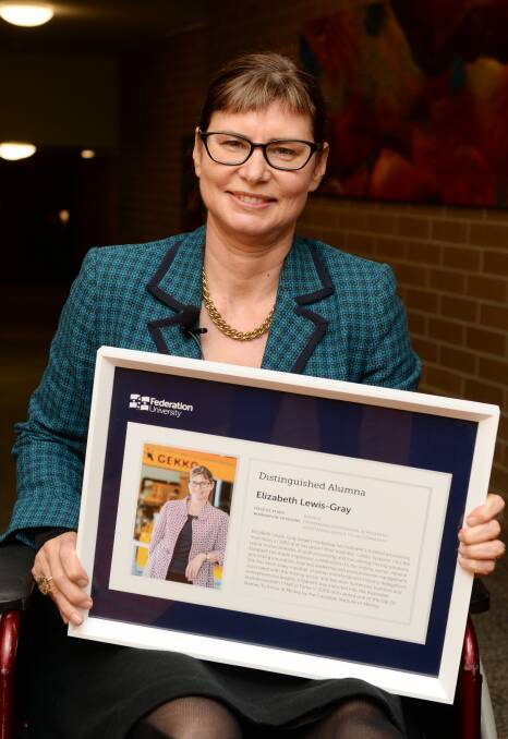ALUMNI: Gekko co-founder Dr Elizabeth Lewis-Gray with her distinguished alumna award from Federation University. Picture: Kate Healy