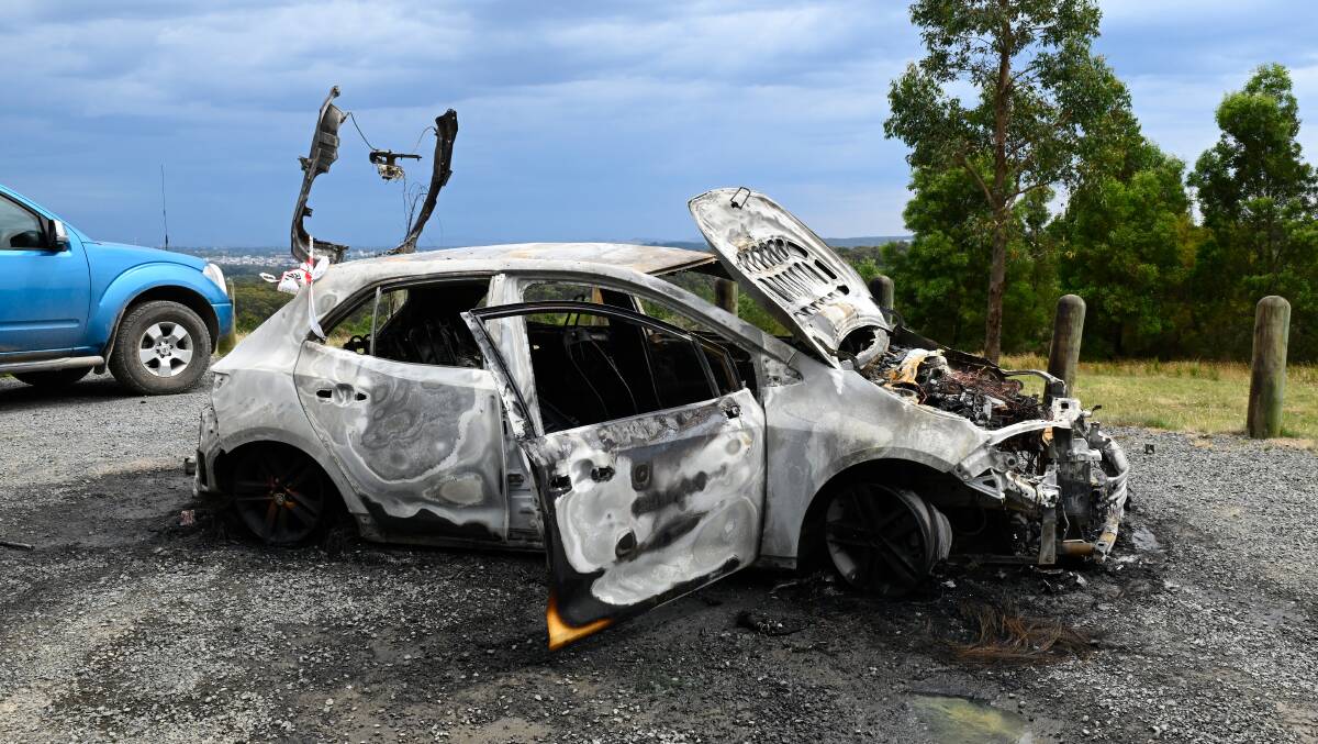 A burned out Toyota Corolla at the Woowookerung lookout in Canadian. Picture by Adam Trafford