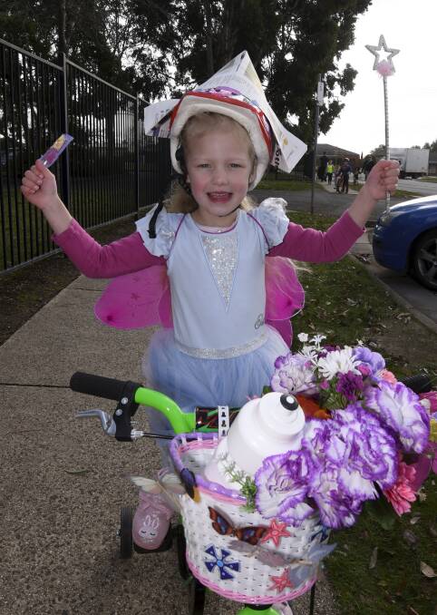 Foundation student Rose did a ride-by of the Alfredton Primary School's fun day. Picture: Lachlan Bence