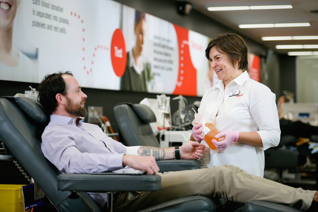  NEW RULES: Lifeblood staff member Anna Georgelin with tattooed plasma donor Jarrod Reynolds. Picture: supplied