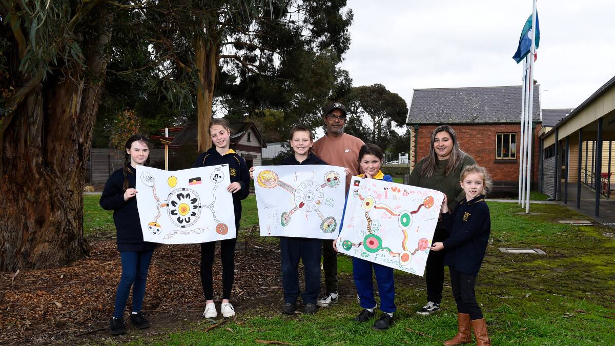 DESIGN: Woady Yaloak Primary pupils Abbie and Kiarnii (Snake Valley), Chase (Scarsdale), Shenay and Charli (Smythesdale) with BADAC cultural connections worker Peter Shane and BADAC youth engagement worker Ebony Sladdin. Picture: Adam Trafford