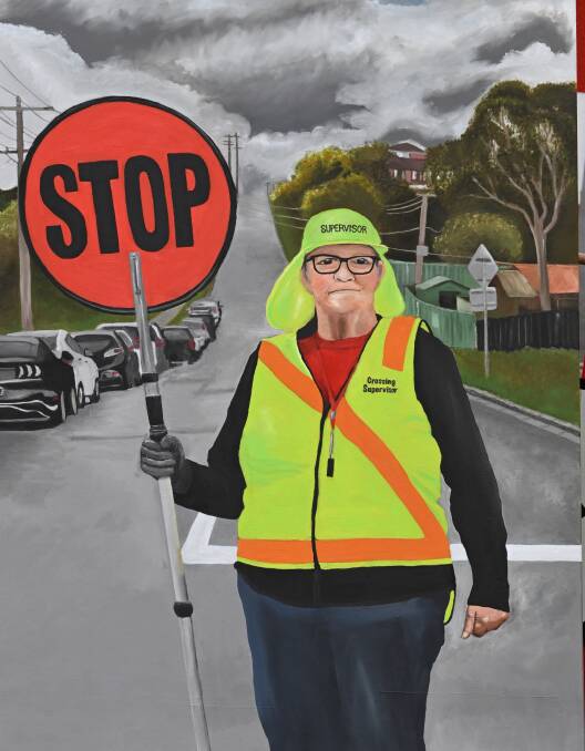 Artist Araceli Zumaglini's portrait of Black Hill Primary School crossing supervisor Lois Block. Picture by Lachlan Bence