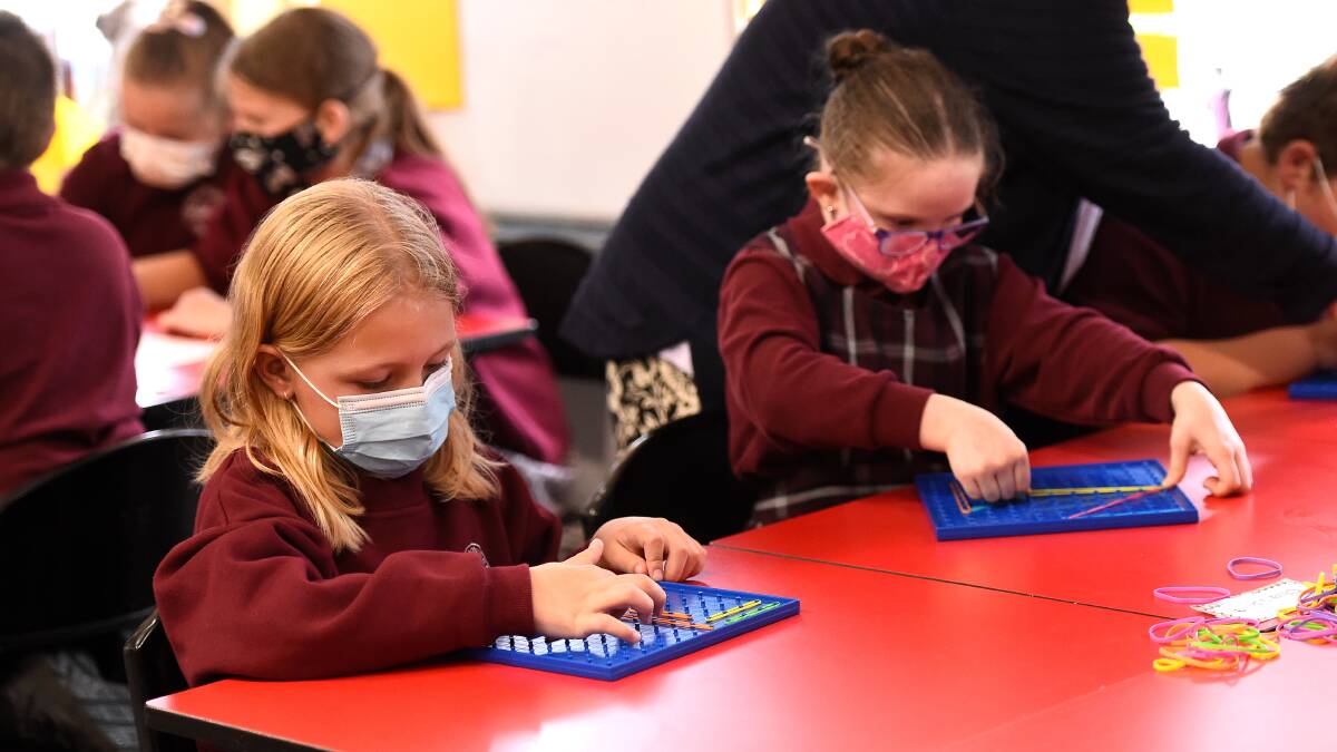 CONCENTRATION: Tahlia and Charlotte are hard at work during a numeracy class at Wendouree Primary School. Picture: Adam Trafford