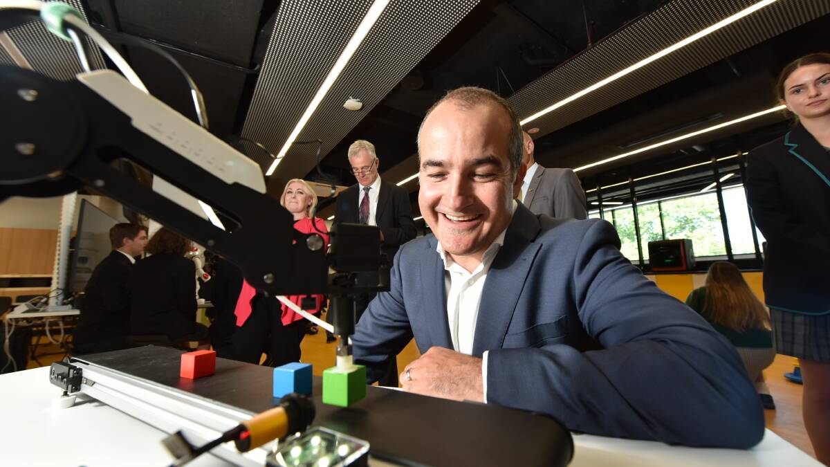 HIGH TECH: Education minister James Merlino inspects equipment in the advanced manufacturing laboratory space at the new Ballarat Tech School, which will link learning and projects with local industry. Picture: Jeremy Bannister