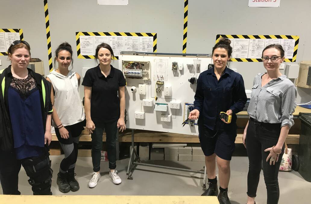 POWER: Erin Nielsen, Jazmin Fazzolari, Lisa Hughes, Kelly Golder and Holly Harper are undertaking a pre-apprenticeship Cert II in Electrotechnology at Fed Uni TAFE. Picture: Michelle Smith