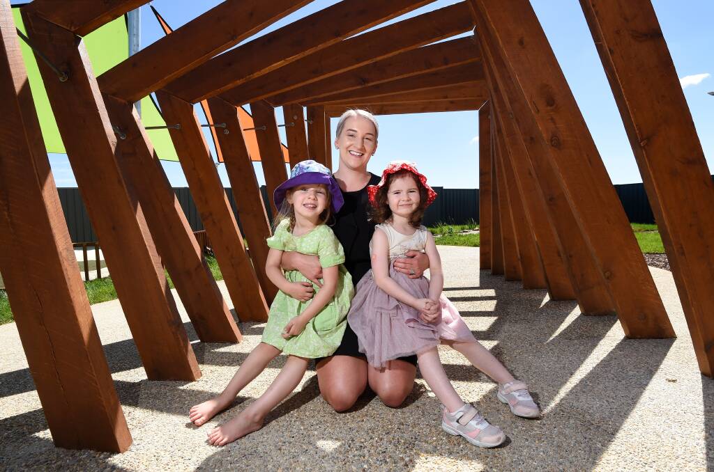 SUNNY: Brady Bunch Early Learning Centre Delacombe director Rachel Condon with Matlida and Ava in the back yard of the new centre which opened this week. Picture: Adam Trafford