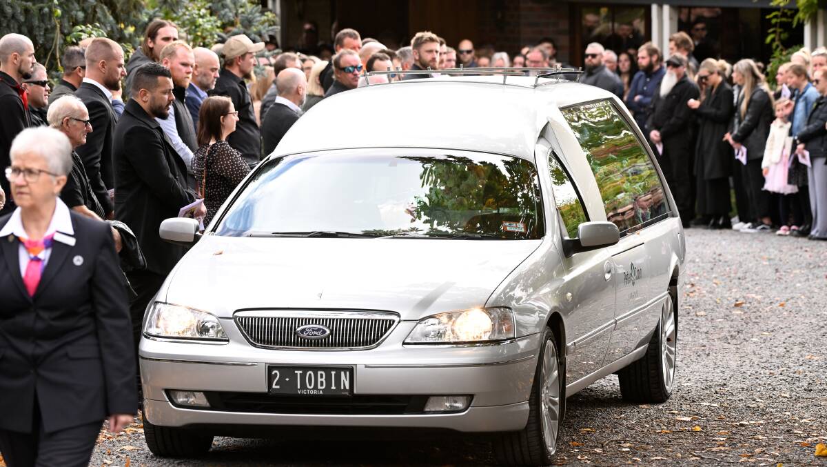 Mourners bid a final farewell to Hannah McGuire on Monday. Picture by Adam Trafford