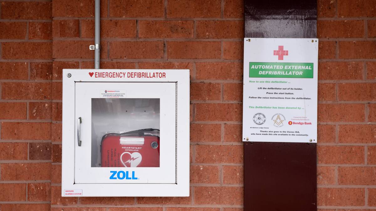 VITAL: The public defibrillator on the wall of Clunes IGA which was used to save Bill Stavretis' life. Picture: Adam Trafford