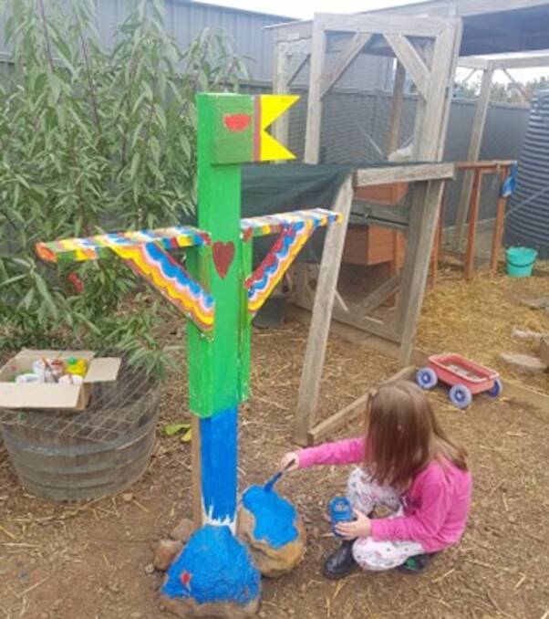 CREATIVE: Junior student Ellie with her bird-shaped bird feeder built at home during remote learning. Picture: supplied