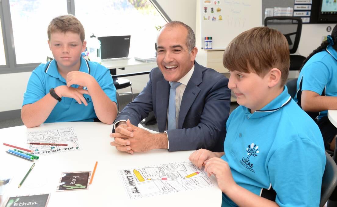 Education minister James Merlino with Quinlan and Rory on the first day of learning at the new Lucas Primary School. Picture: Kate Healy