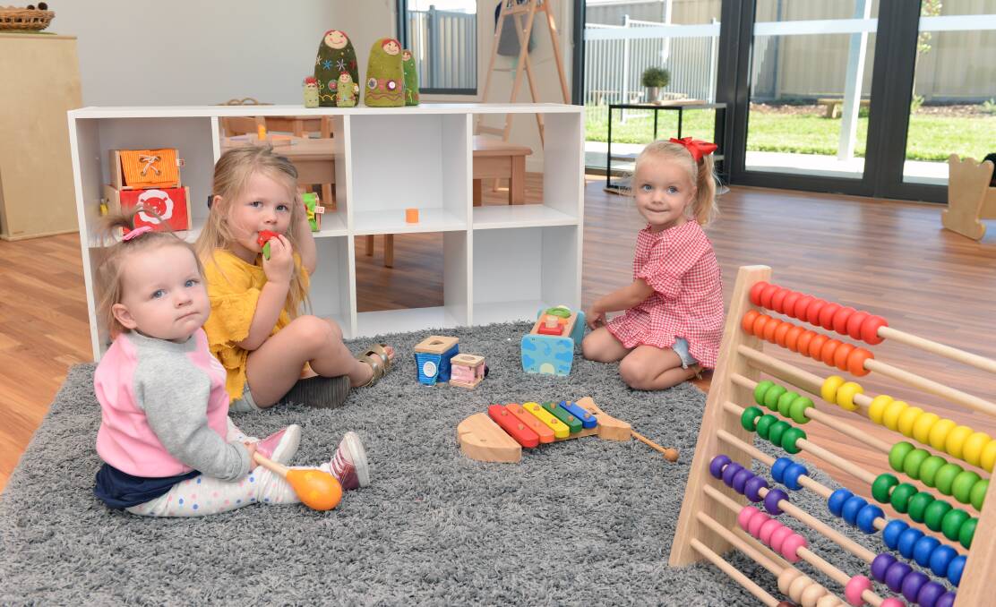 NEW BEGINNINGS: Zoe, 13 months, Indy, 4, and Ruby, 3, get a sneak peek of the rooms and toys at the new Brady Bunch Child Care Centre in Sebastopol ahead of its expected opening later this month. Picture: Kate Healy.