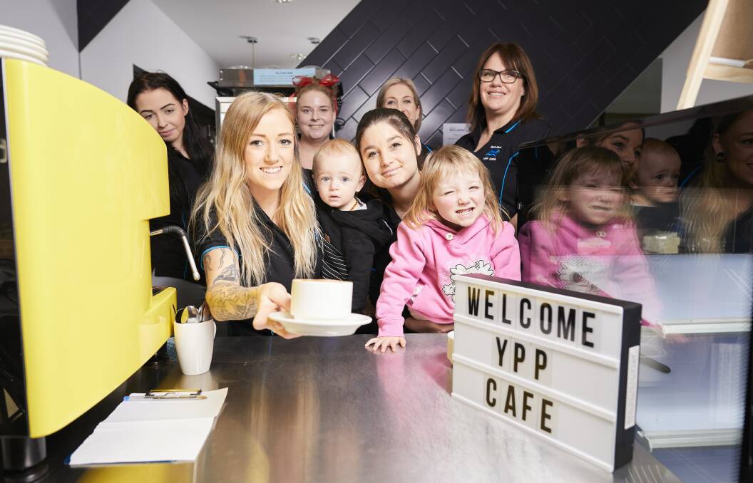 HOSPITALITY SKILLS: Yuille Park Young Parents Program ran a project to operate the cafe at Ballarat Community Health in Lucas. From back left, Molly Beaton, Demi Swire, Renee Vallance, Megan Hillas. Front, Teagan Fisher with Mayson, 1, Ash Kent with Helena, 3. Picture: Luka Kauzlaric