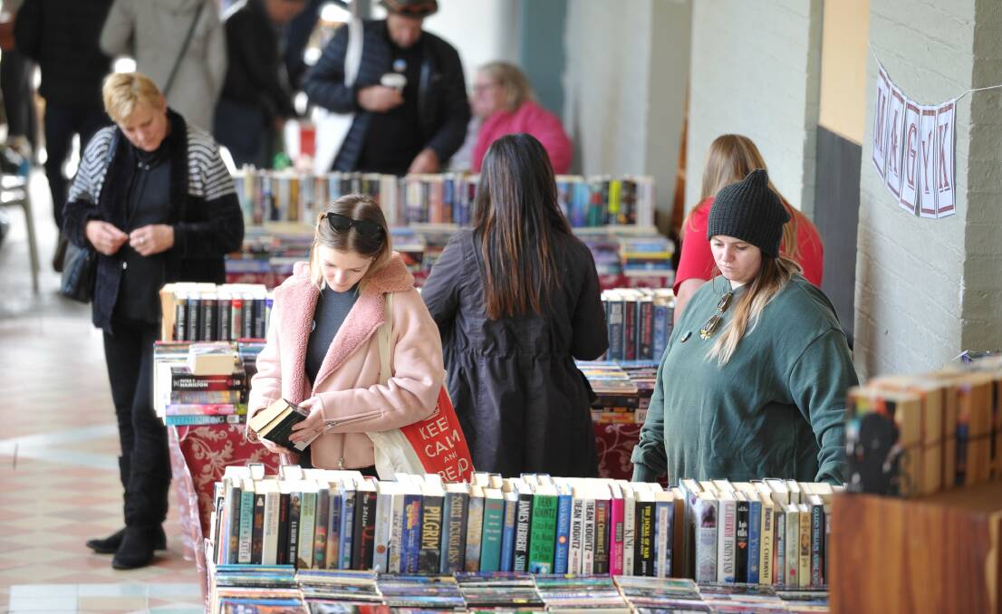 READERS: Browsing the book stalls at the 2019 Clunes Booktown Festival. Picture: Lachlan Bence
