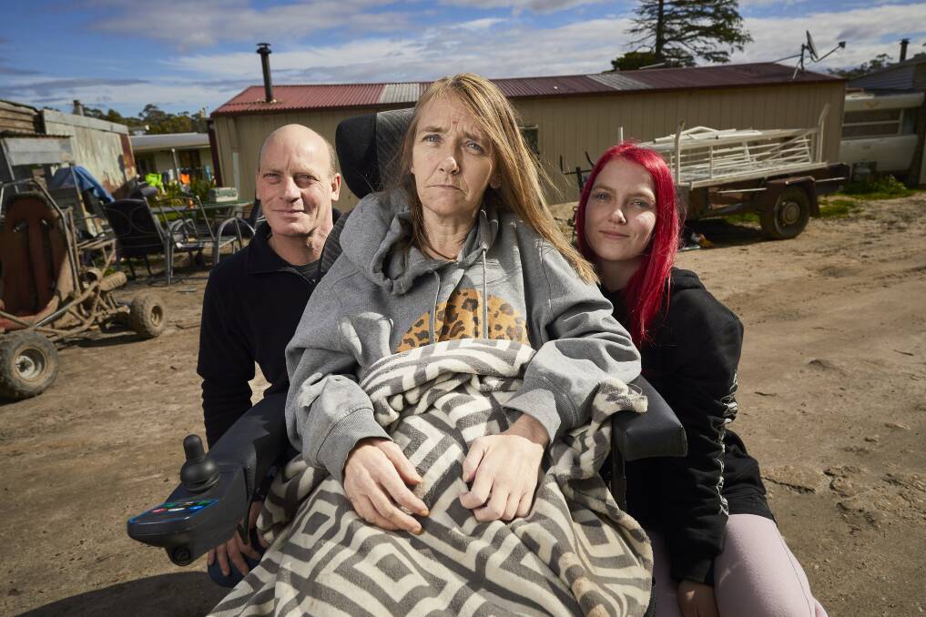 FUNDRAISING: Travis, Jill and Taylah Miller outside the Dereel home they need to renovate to make suitable for Jill, who has motor neurone disease. Picture: Luka Kauzlaric