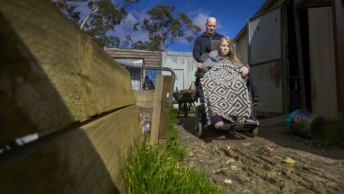 MUDDY: The Millers need to upgrade their home and its access so Jill can easily navigate it in the wheelchair on loan to her from MND Australia. Picture: Luka Kauzlaric