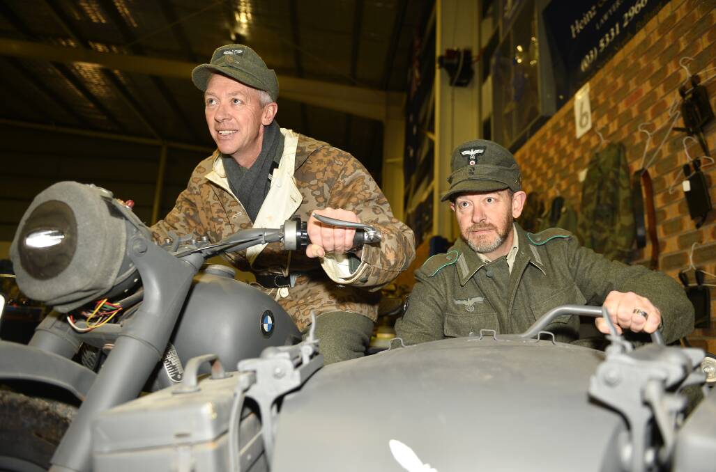 WAR HISTORY: Andy and Ian Keefe at last year's Eureka Arms and Militaria Fair at the Wendouree Sports and Events Centre. 