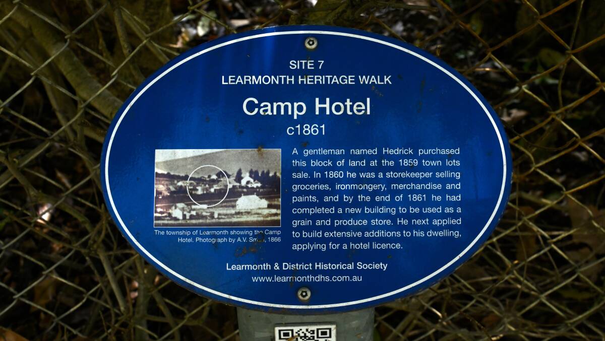A sign details the history of the site.