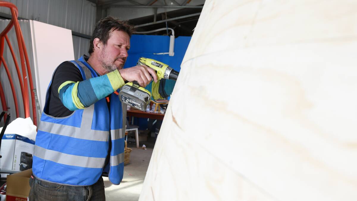 FINAL STRAIGHT: Derek John is hard at work building walls and plinths for the artworks going on display across Ballarat for BOAA next month. Picture: Kate Healy