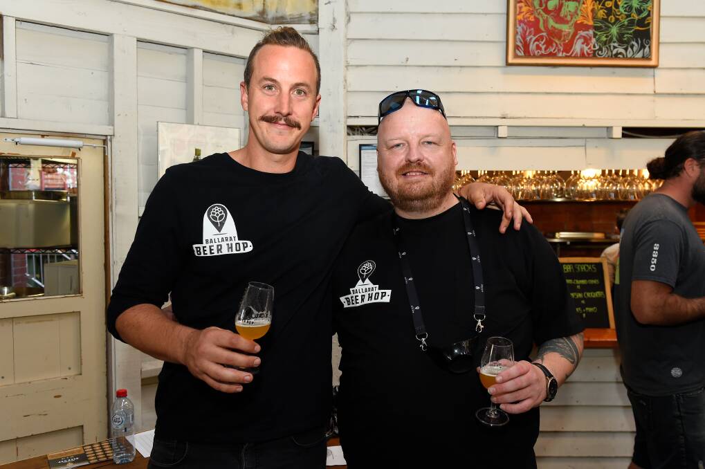 HOPS: Sam Miller and Max Hamond enjoy a brew at The Pub With Two Names during the Ballarat Beer Hop. Picture: Adam Trafford