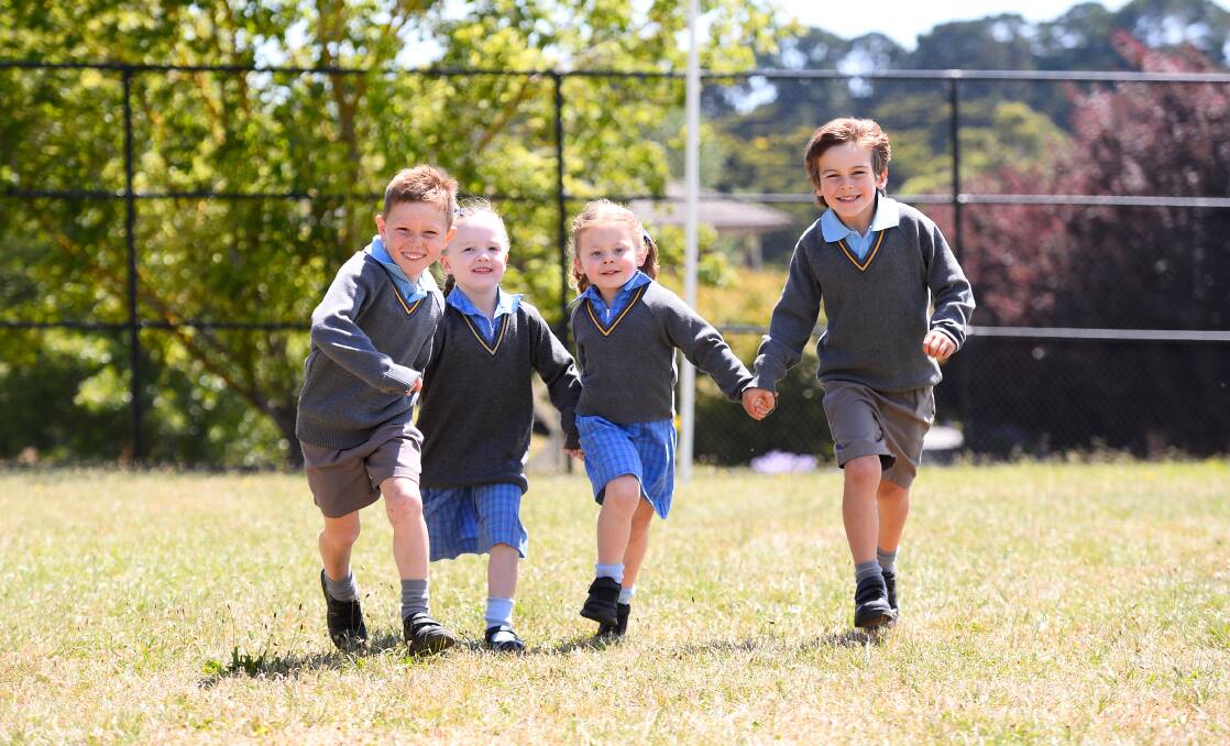 St Brigid's Primary School Ballan pupils Brodie, Alice, TJ, Clancy are among 25 new preps to start at the school - a big increase from the eight preps who started last year. Picture by Adam Trafford 