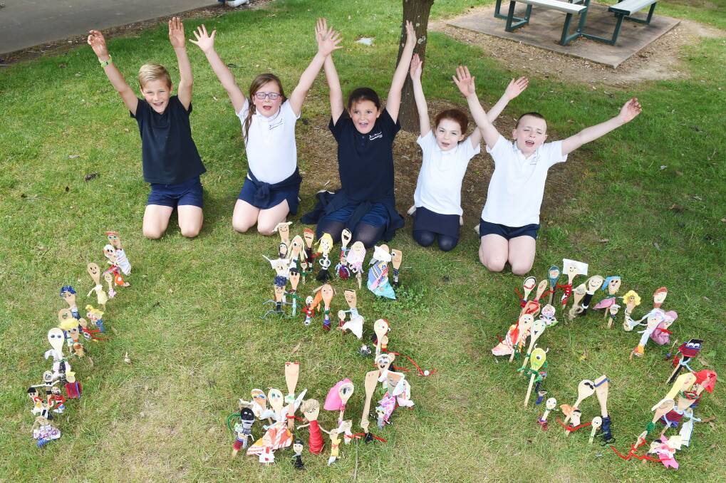 PARTY TIME: Darcy, Matilda, Phoebe, Abbey and Rylee celebrate Napoleon Primary School's 150th anniversary with their Spoonville creations. Picture: Kate Healy