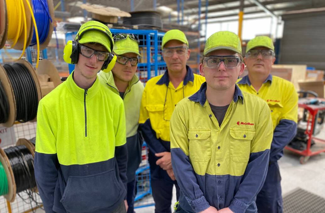 TEAM: McCallum supported employee supervisor Rob Poloni (centre back) with supported employees (front) Brandon Shroder Smith, Dylan Hucker and (rear) Craig Stephenson and Paul Houlihan. Picture: supplied
