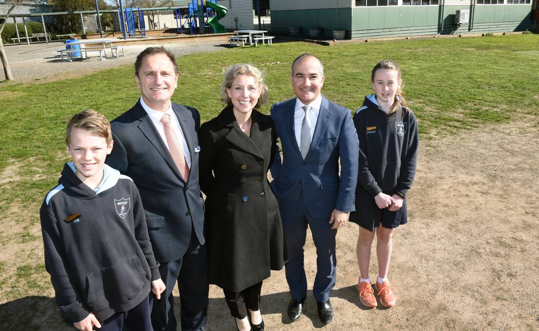 NEW START: Miners Rest school captain Joe, principal Dale Power, Labor candidate for Ripon Sarah De Santis, education minister James Merlino and school captain Zahara. Picture: Kate Healy 