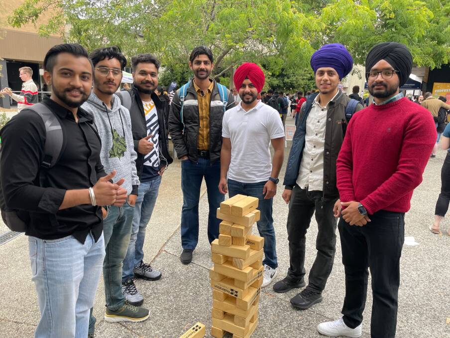 Federation University students get to know each other while playing Jenga at O-Week festivities. Picture supplied