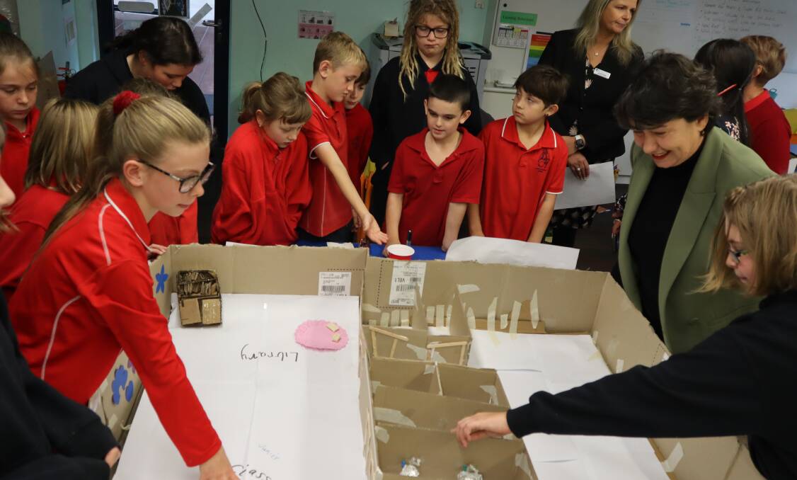 FUTURE: Linton Primary School pupils show MP Michaela Settle a 3D model of what they would like in the redevelopment of their school. Picture: supplied