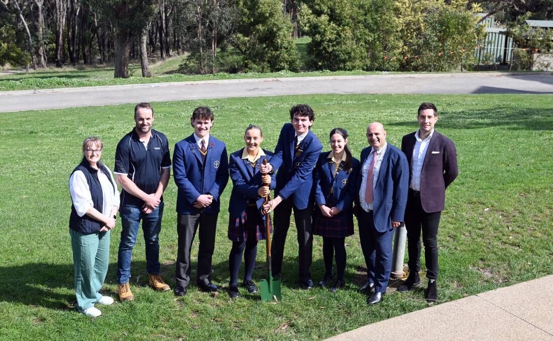 Damascus school advisory council chair Lucy O'Beirne, Nicholson Construction project manager Mick Page, 2023 school captain Xavier Byrne, 2024 school captains Paris Govan and Lucas Wells, 2023 school captain Sophie Busuttil, principal Steven Mifsud and Law Architects' Chris Cogdon on the site of the new Damascus College senior learning precinct. Picture by Kate Healy