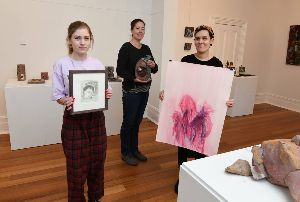 VENUS RISING: Artists Rachel Power, Myfanwy McLean and Mel Jane Wilson with their works at the Backspace Gallery. Picture: Lachlan Bence. 