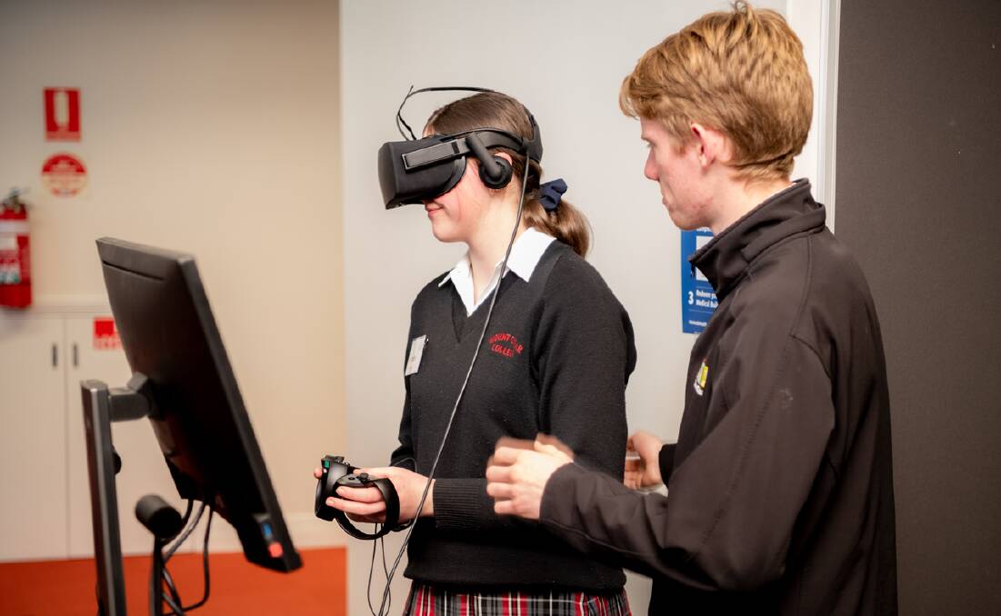 TECH FUTURES: Mount Clear students explore the Virtual Reality Learning Studio at the University of Melbourne. 