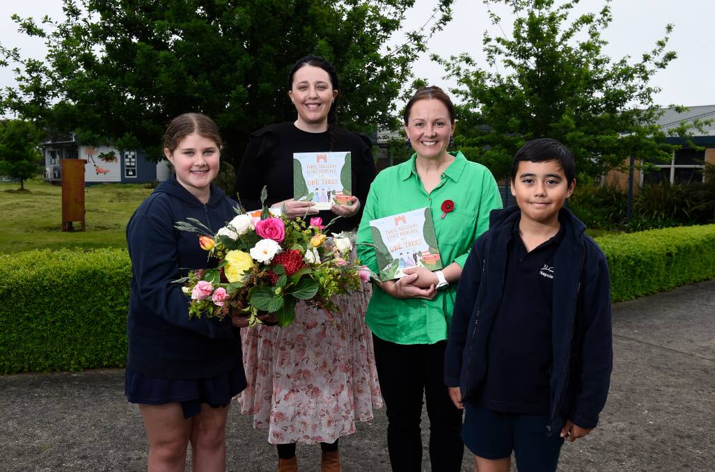 Napoleons Primary pupils Mikayla and Nathan with Liv Lorkin and Naomi Irvin who created the book Three Thousand Eight Hundred and One Trees (and each one has a name) about the Avenue of Honour. Picture by Adam Trafford