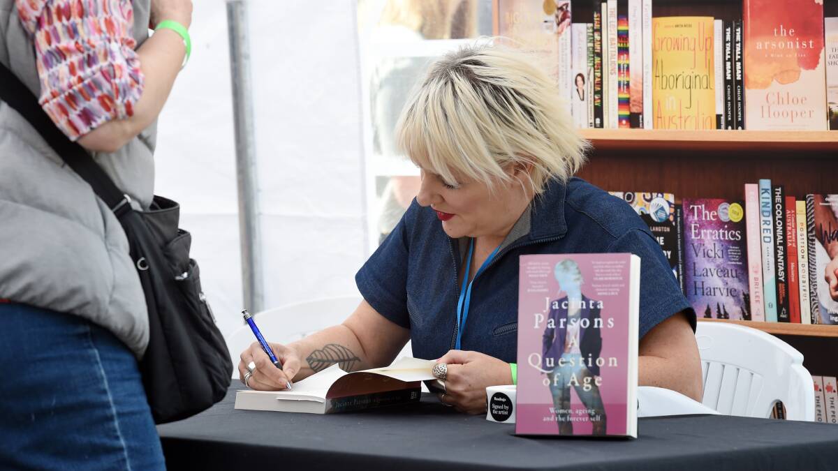 Jacinta Parsons signs her book A Question of Age at Clunes Booktown Festival 2023. Picture by Kate Healy