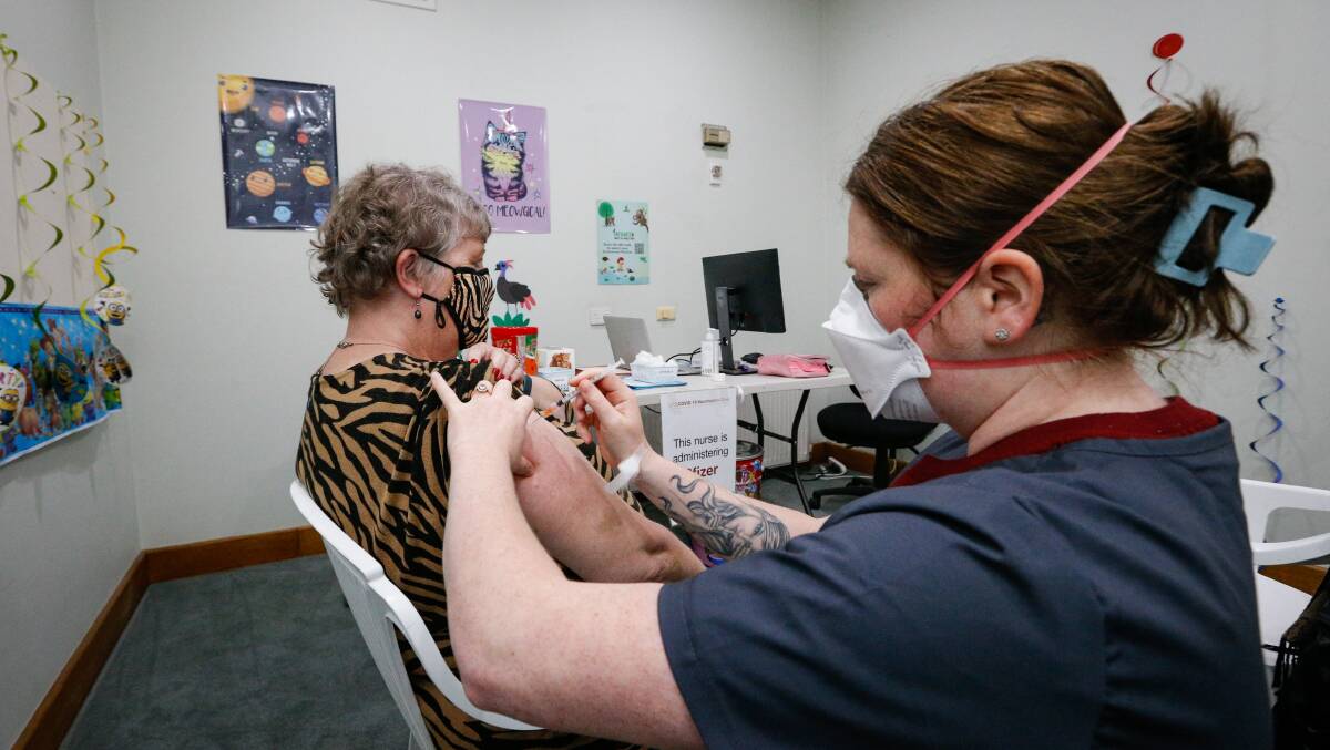 JABBED: Stella Coffey gets her fourth COVID-19 vaccination from nurse Darcie Johns at the UFS vaccination clinic. Picture: Luke Hemer