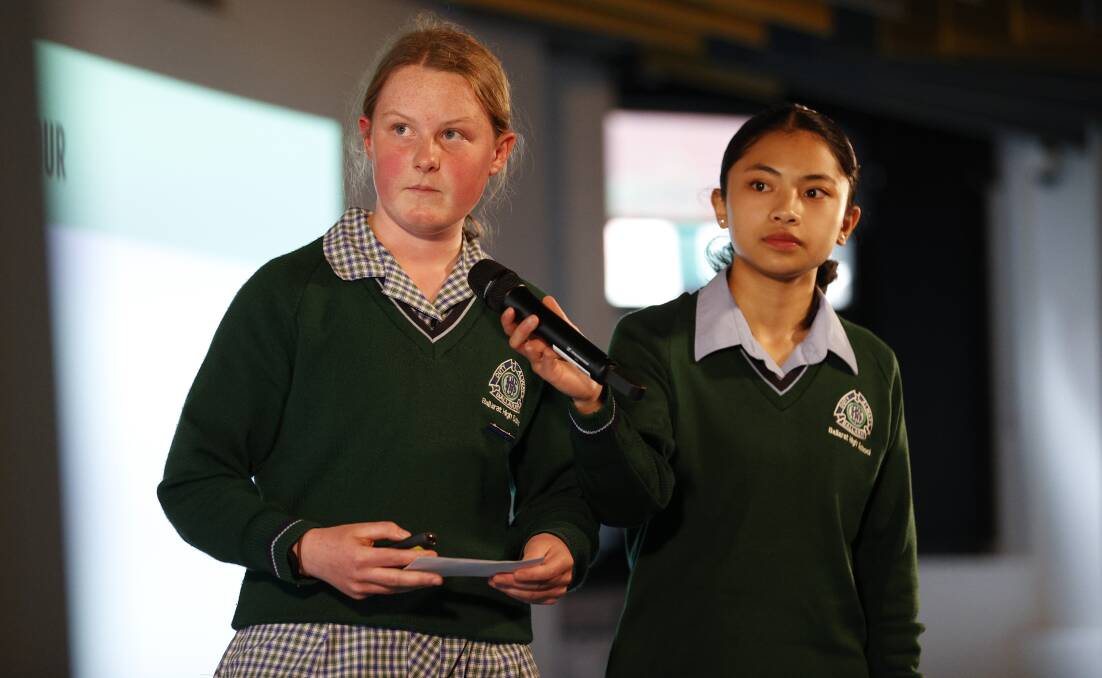 TASTE: Ballarat High School students Audrey English and Wheng Marbella present their research on Skittles to the judges. Picture: Luke Hemer
