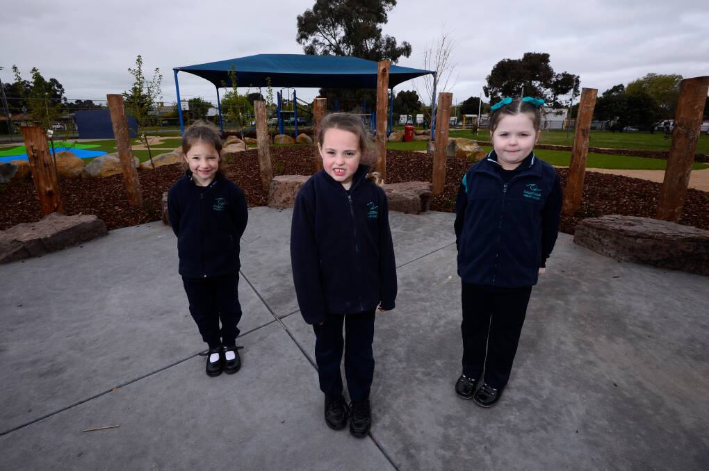 PLAYTIME: Caledonian Primary School pupils Lydia, Sienna and Mayah in a new play area completed during COVID lockdown. Picture: Adam Trafford