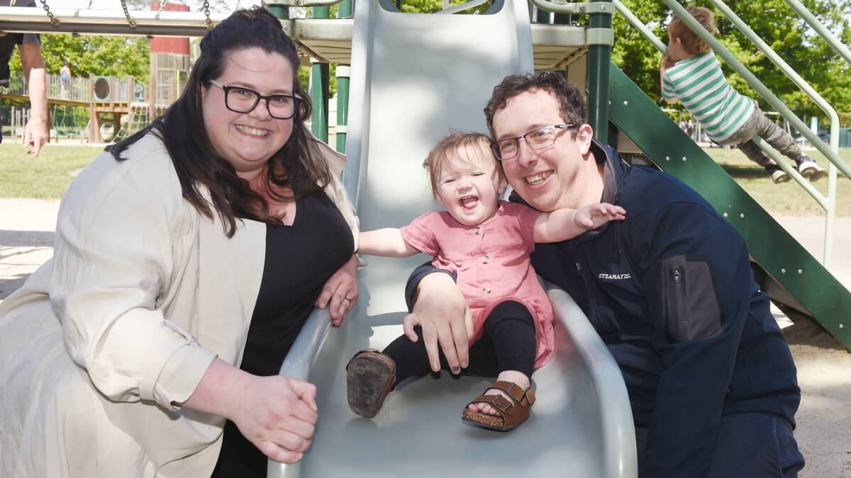 FAMILY TIME: Amanda, Sophie and Benny Stewart have some fun in the sun at Victoria Park. Picture: Kate Healy